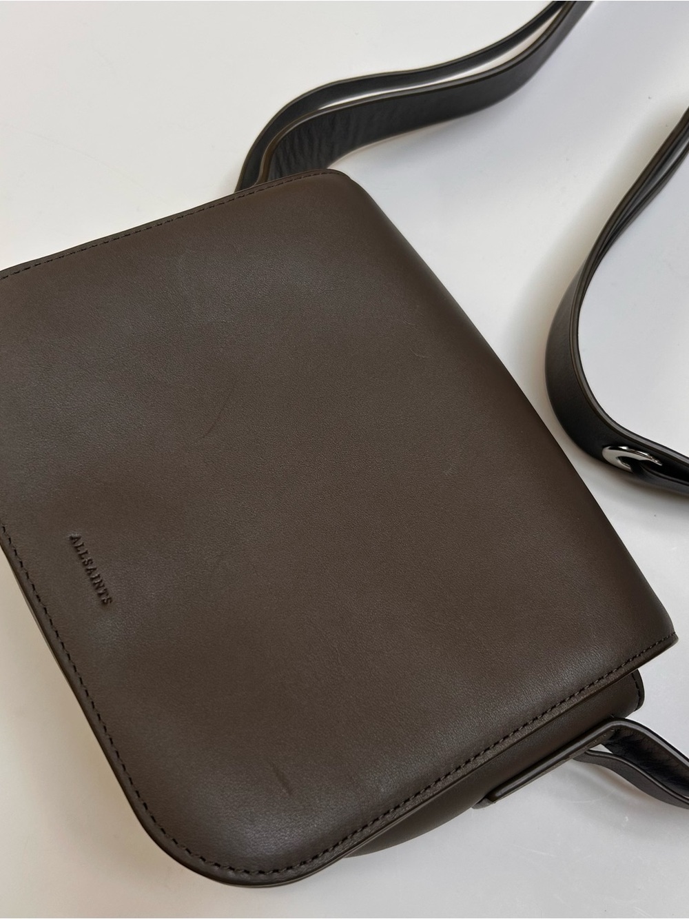 ALLSAINTS crossbody leather bag.